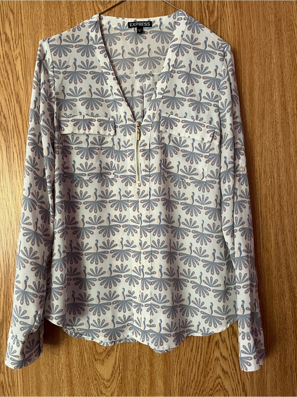 Express Cream Blouse with Gray Peacock Print and Zip V-Neck